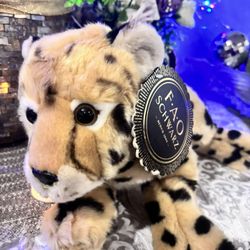 Beautiful Cougar cub style), approximately 12 inches long. Brand tag is still attached.  Soft, high-quality plush with realistic markings great for gi