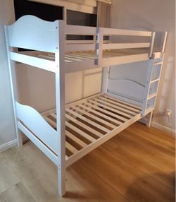 Twin bunk bed. Available in espresso, white, & grey. Bunk bed only-$299. With mattresses-$450. Assembly required. Assembly not included. Tax included.