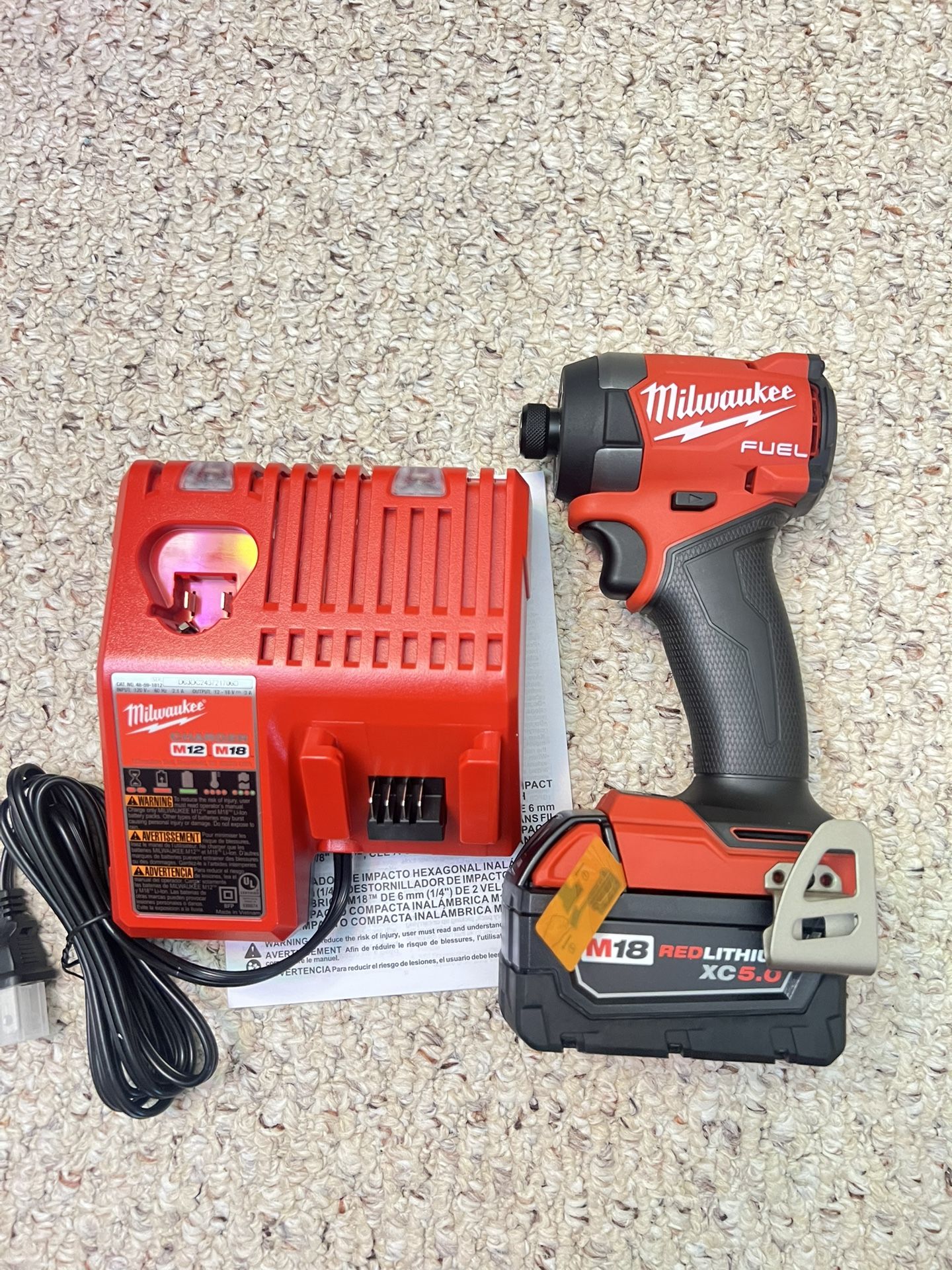 Milwaukee M18 Fuel Brushless 4-speed Mode 1/4” Hex Impact Driver With 5.0Ah Battery and Charger