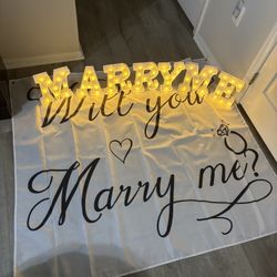 Marry Me Signage And Tapestry Wedding Proposal