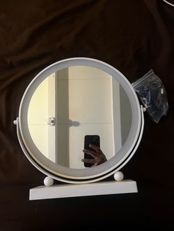 Mirror with light