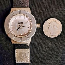 men's vintage Guess watch silver gray with a black and gray watch band and a new battery $5