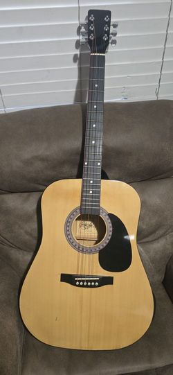GUITARRA ACOUSTICA EFEZAN $89 OBO