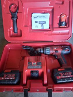 Milwaukee hammer drill & 2 new batteries.