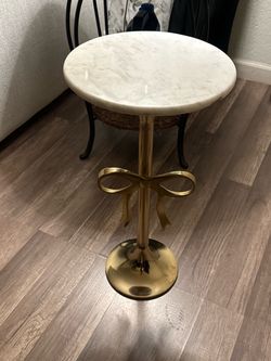 Round Marble Top Side Table with Gold Bow Base