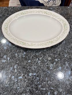 Vintage Four Crown China Platter pattern “Claridge”.  Pretty floral design.  Size 14 inches wide and 10 inches long.  Preowned Excellent condition no 