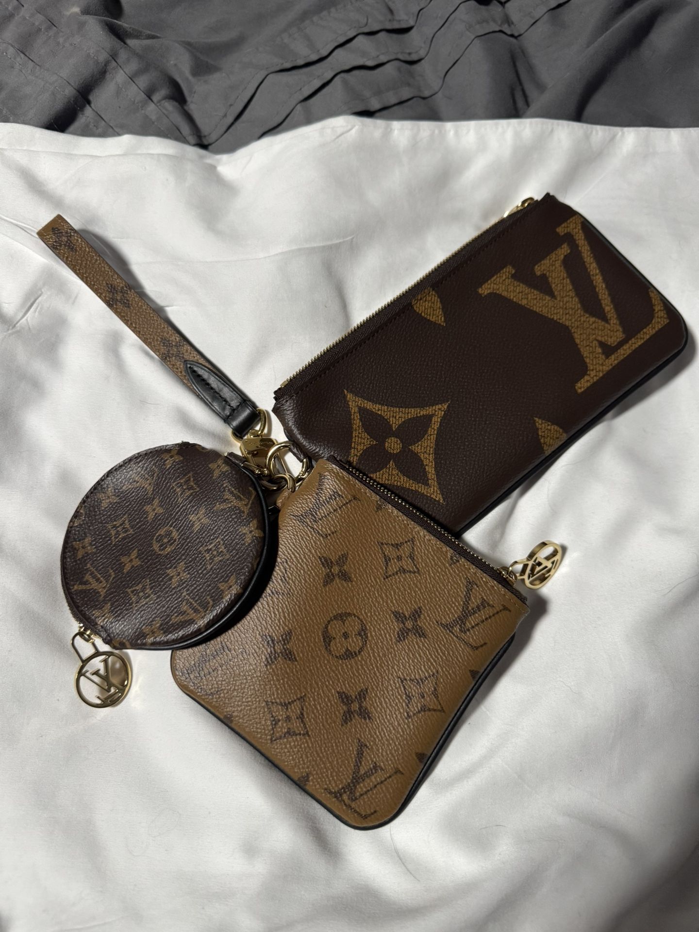 Louis Vuitton Reverse Monogram Giant Trio Pouch