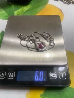 Ladies, silver, diamond, and Ruby, necklace and pendant