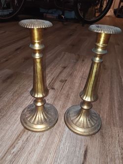 vintage brass candlestick holders, potentially from Baldwin Hardware