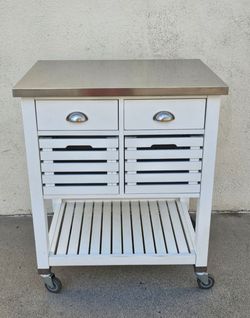 Stainless steel rolling kitchen cart with drawers and bins