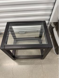 Coffee table with glass on top