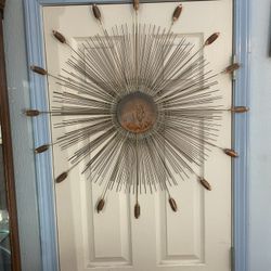 Metal starburst wall art