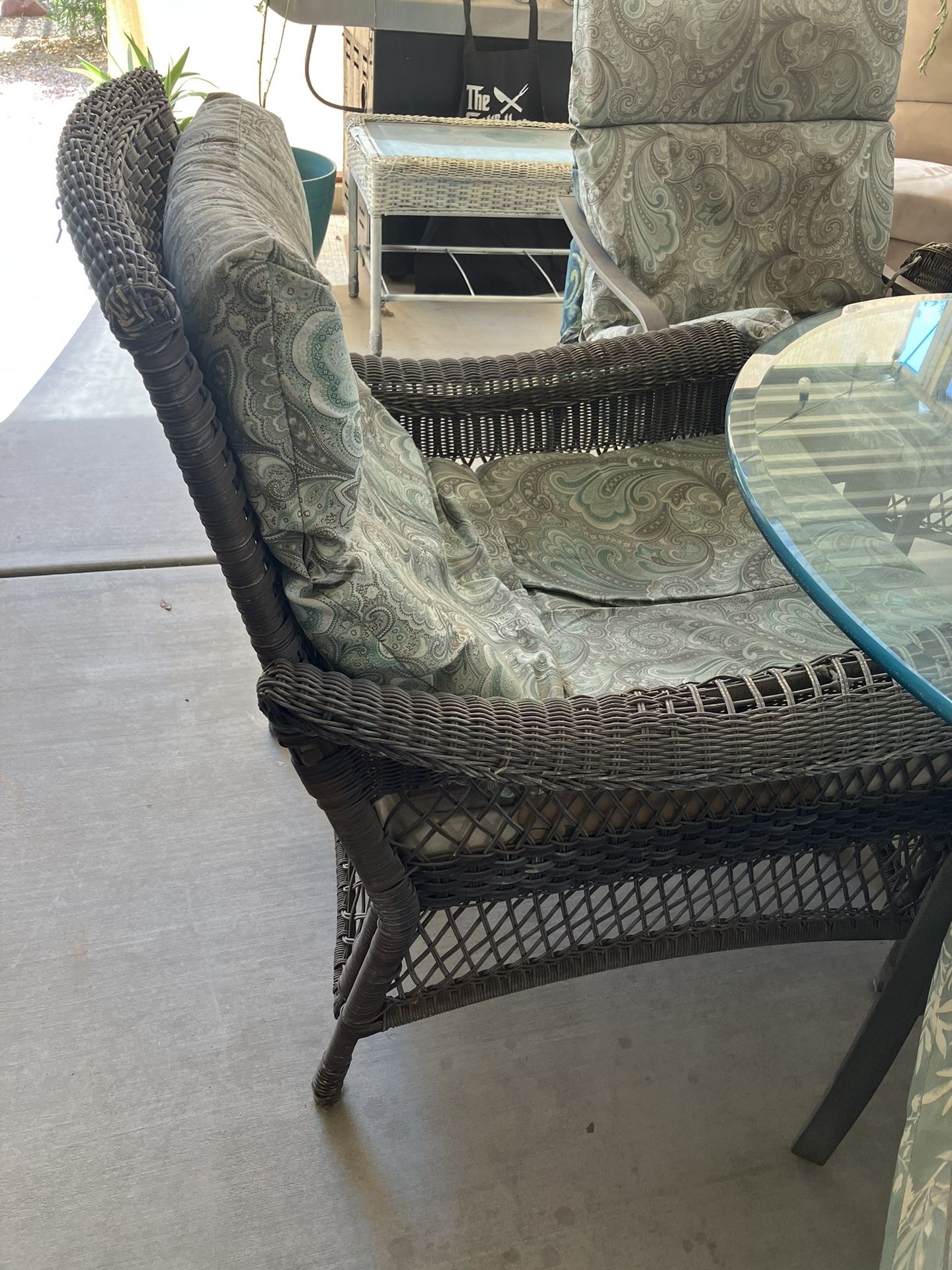 Two chairs with cushions