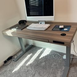 Apple iMac desktop computer with keyboard and mouse