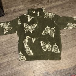 Soft green sweater with butterflies