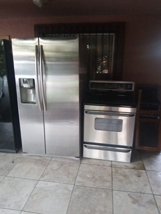 Stainless Refrigerator And Stove $450