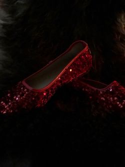 Red sequin, flat shoes.