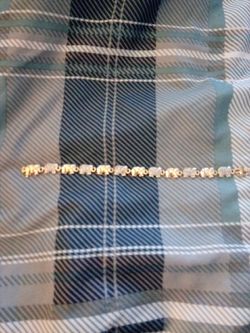 Gold plated elephant link bracelet with diamond accent