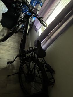 Black Sport Bicycle with Front Basket and Rear Rack