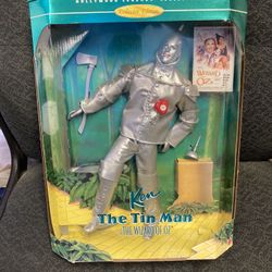 Vintage kenBarbi  is the tin man Wizard of Oz Hollywood collection dial