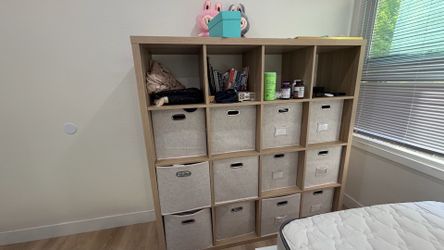 IKEA KALLAX 4x4 shelving unit with 16 storage cubes