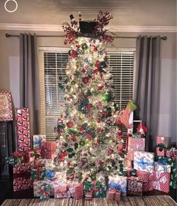 Pre lit 7.5’ flocked tree (decorations not included)