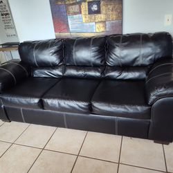 Leather Loveseat And Sofa. 