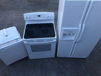 White side by side kitchen appliance set