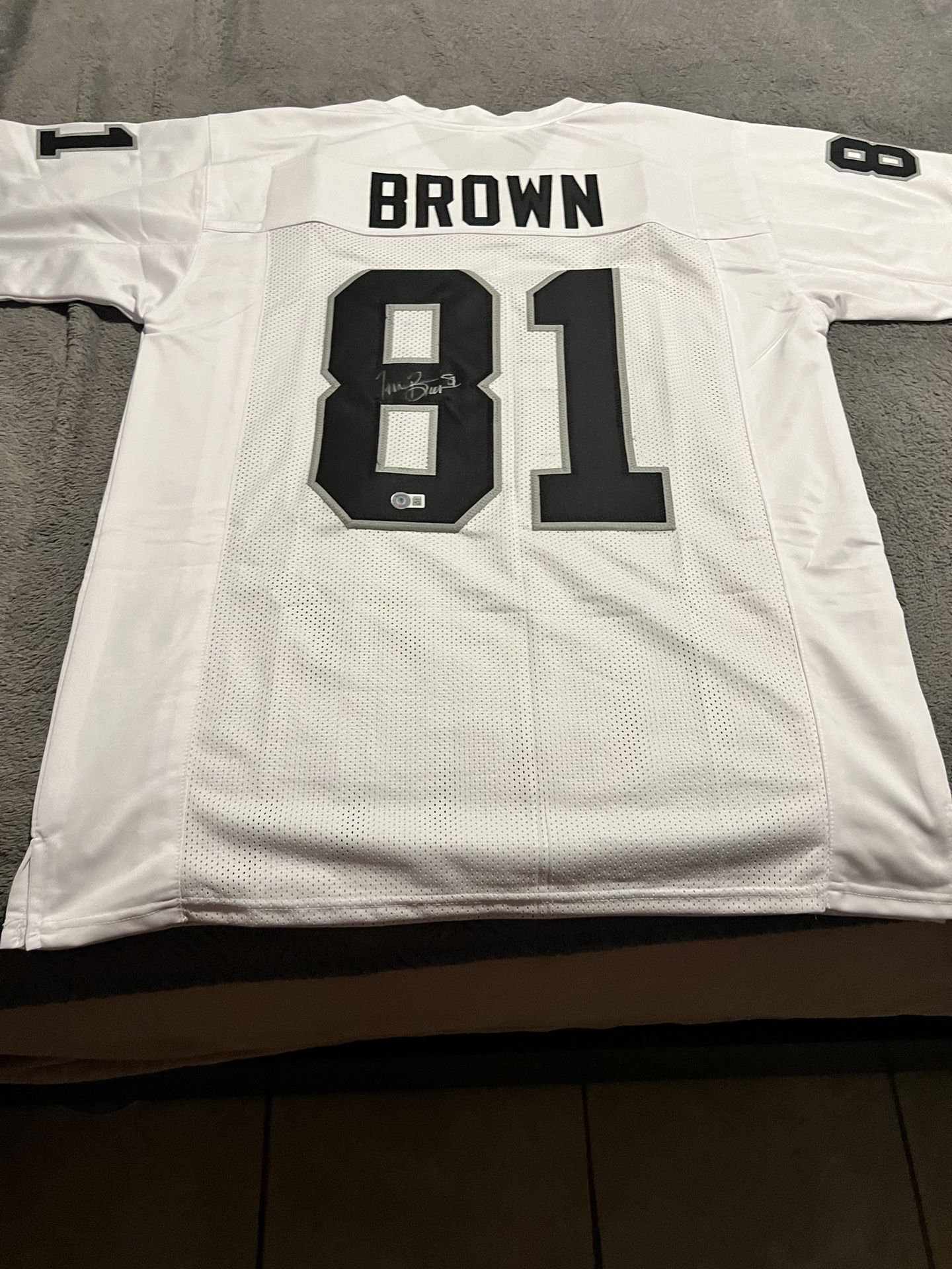Tim Brown Signed Raiders Jersey