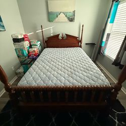 Beautiful 4 corner post solid wood Queen bed with mattress & boxspring