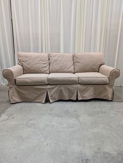 Pottery Barn Beige Slipcovered Couch in Cotton