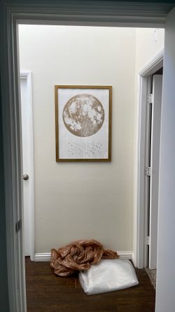 large gold framed wall art moon