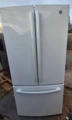 White French Door GE Refrigerator 68" H x 33" W x 27" D