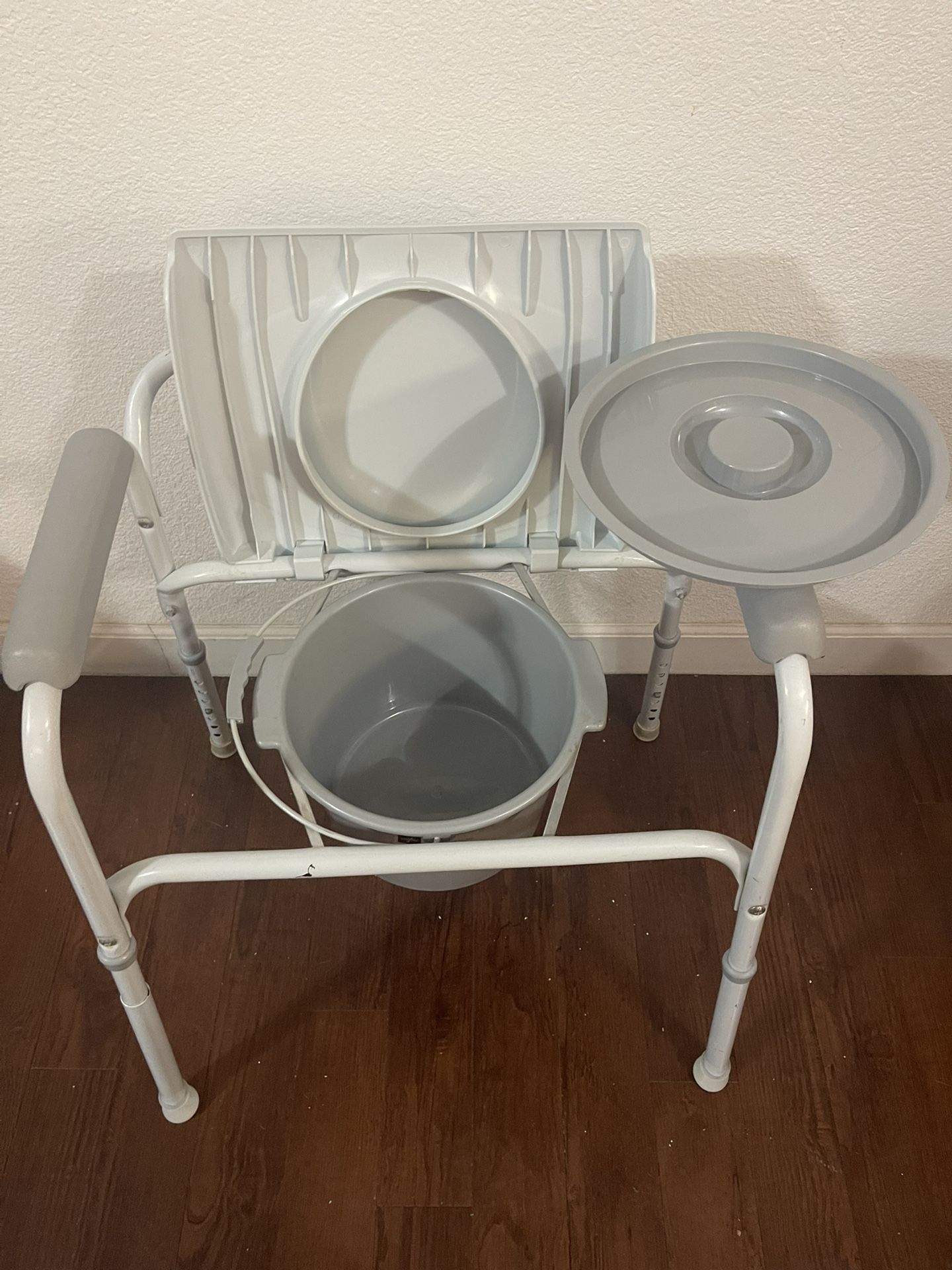 Adjustable Bedside Or Over The Toilet Cammode