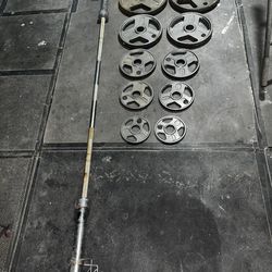 45lbs (2”Olympic) 7ft Barbell w/ Spring Collars & 35’s, 25’s, 10’s, 5’s, 2.5’s Metal Weight Plates