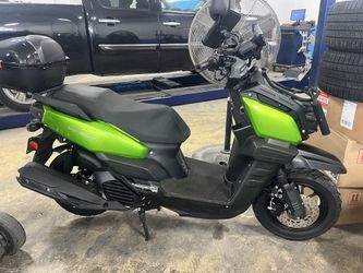 2023 Yiben YB 150cc Moped in like new conditions with only 1140 miles. Comes with weather protection cover, storage trunk and 2 cell phone holders.