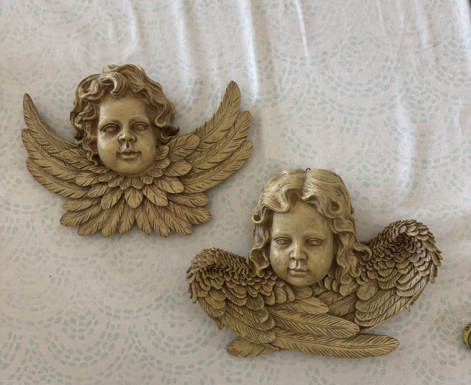 Vintage-style cherub wall sculptures