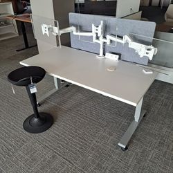 Multiple sit stand desks