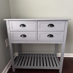Grey 4-drawer cabinet with shelf