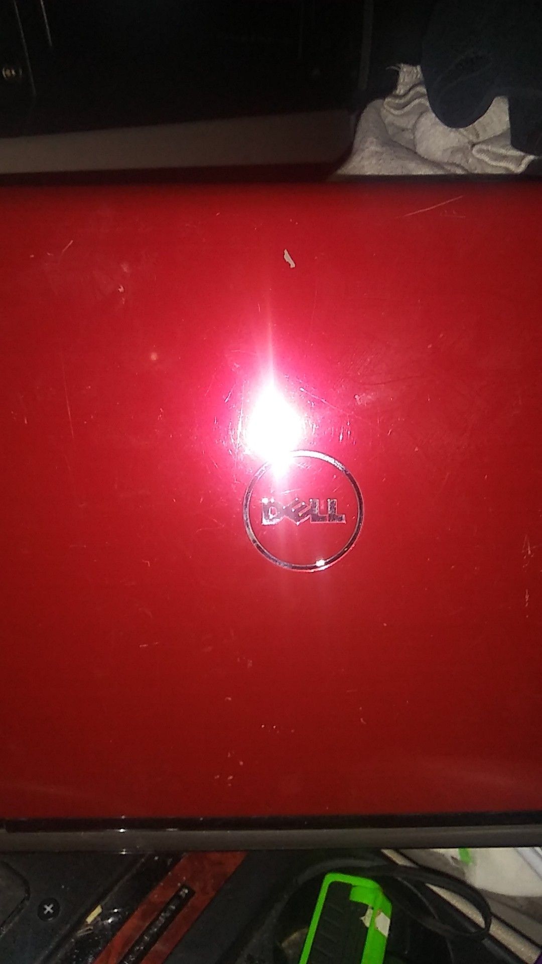 Red dell laptop with charger