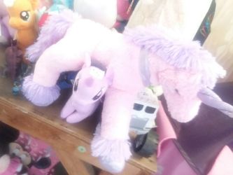 Cute pink and purple horse