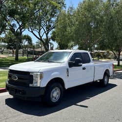 The F250 HD 2019 w/ only 159000 miles , A,C flex fuel, long bed, clean title in hand, updated tags Oct 2027 ready for work