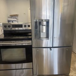 LG Refrigerator And Samsung Stove Stainless Set