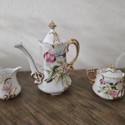 Vintage tea set.  Flower Humming bird.  Hand Painted.