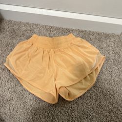 Light orange  lululemon Hotty hot shorts