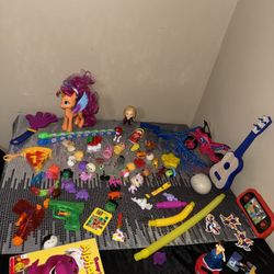 Big Kids Toy Lot - My Little Pony, Captain Marvel, Fidget Toys, Water Guns
