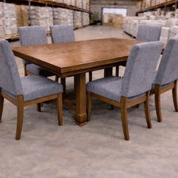 Belmore 9-Piece Dining Set  Open box A few small scuffs from shipping, can easily be touched Save over half off!!!!  You’ll make a statement in your h