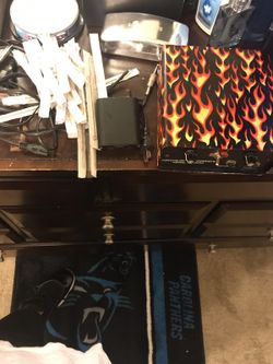 2 tattoo power supply's clip cords and various needles