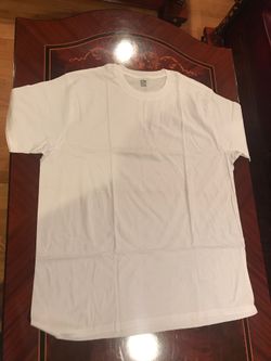 White T-shirt crew neck . Small , large Xl , XXL . Plenty available of each size. Brand new
