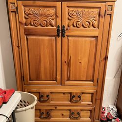 Wooden Armoire with Carved Design